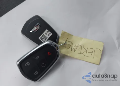 2022 Cadillac Xt4 Sport from USA, damaged, VIN 1GYFZFR47NF100801